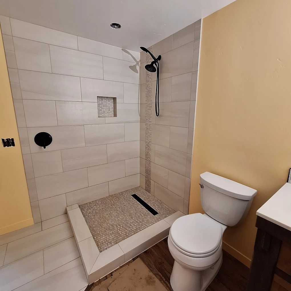Bathroom remodel plumbing with shower and toilet installation