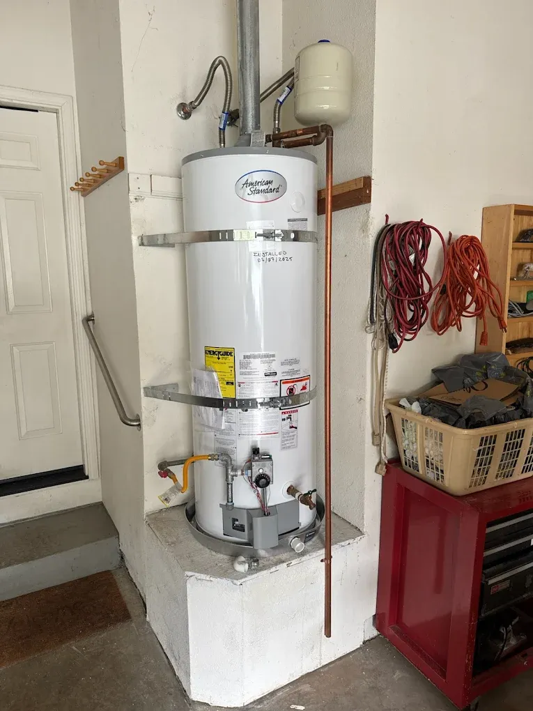 Storage water heater with connected supply piping
