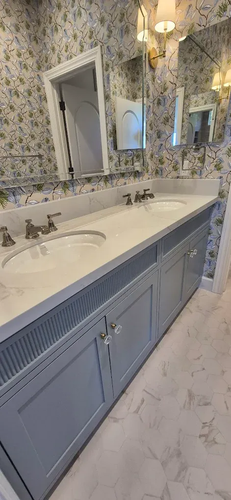 Bathroom vanity with sinks and faucets