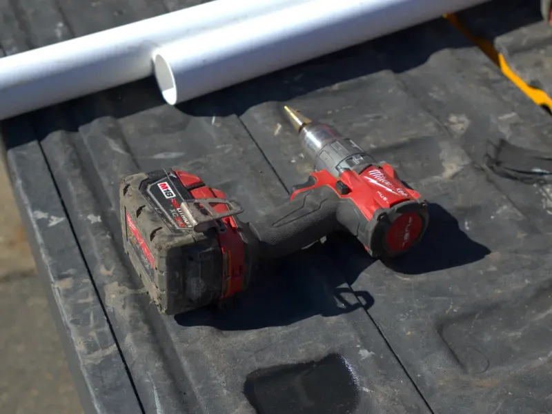 Plumbing tools and pipe on the work truck
