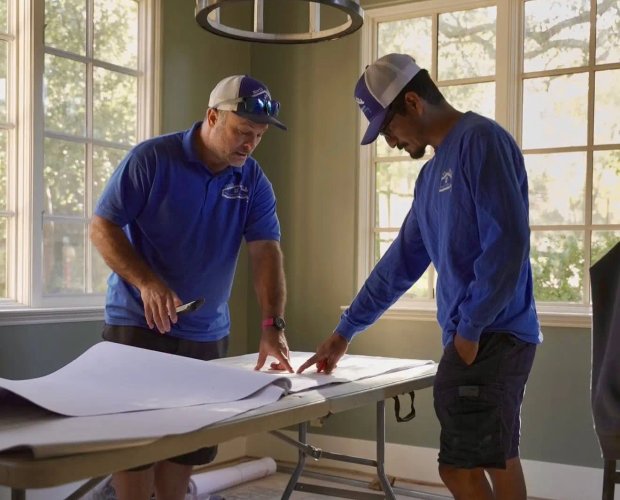 North Bay Platinum Plumbing team reviewing plumbing project plans